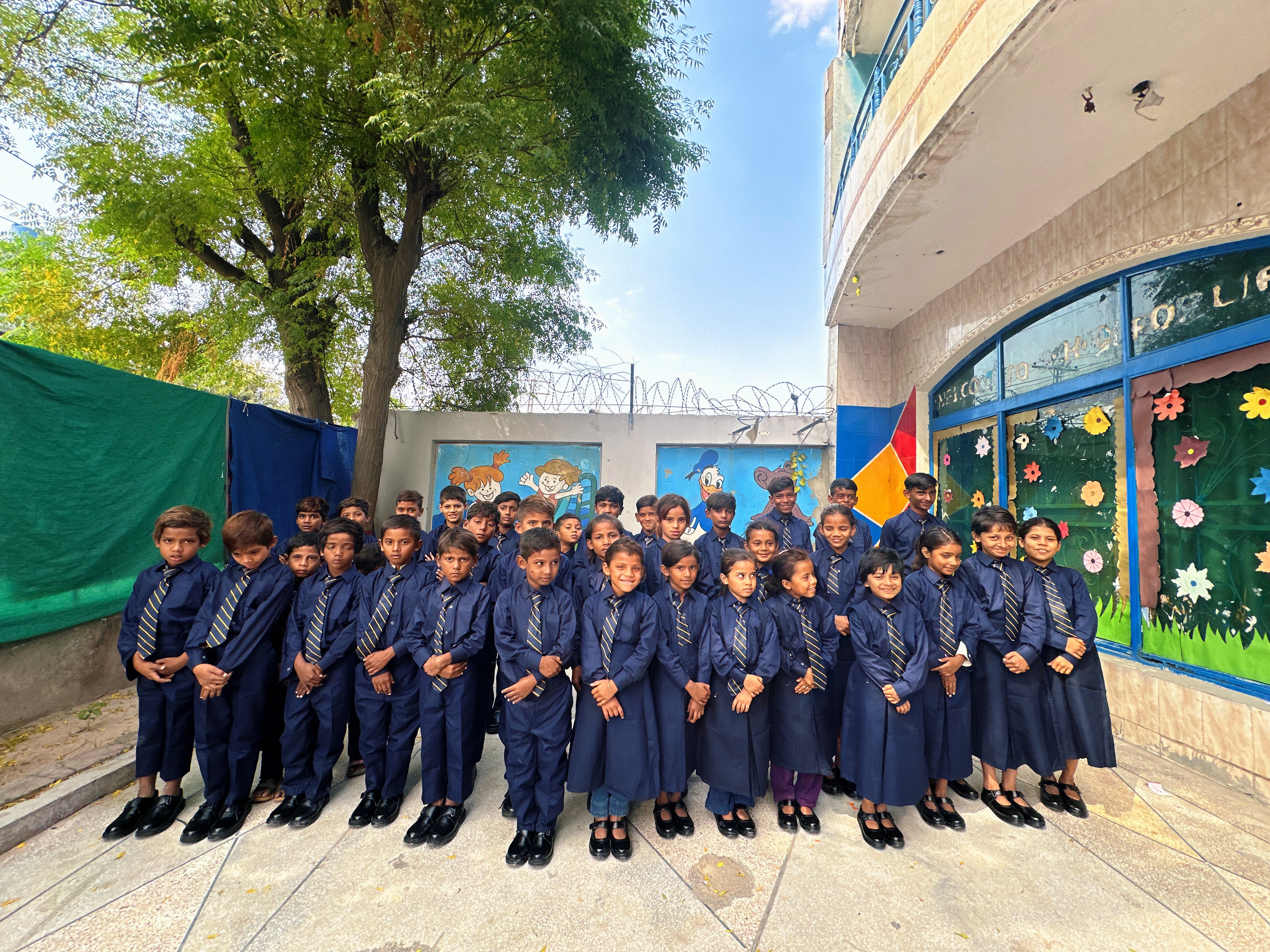 Students at Nayi Uraan Model School learning in classroom